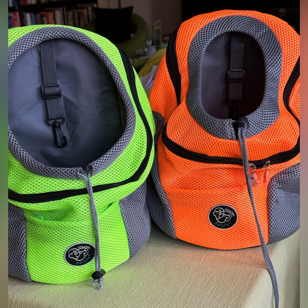 Green & orange small dog backpacks.